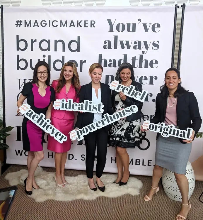 professional women taking power poses at networking event by Biz Coach Studios for entrepreneurs and leaders